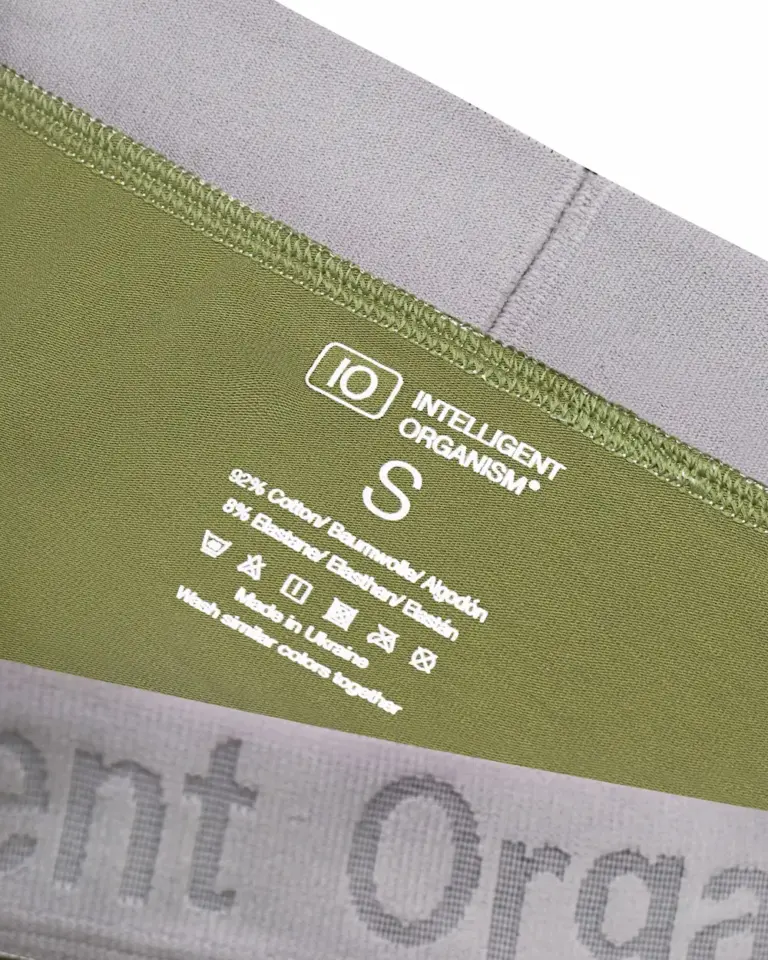 Жіночі зелені стрінги Intelligent Organism — внутрішній вигляд з термотрансферним розміром