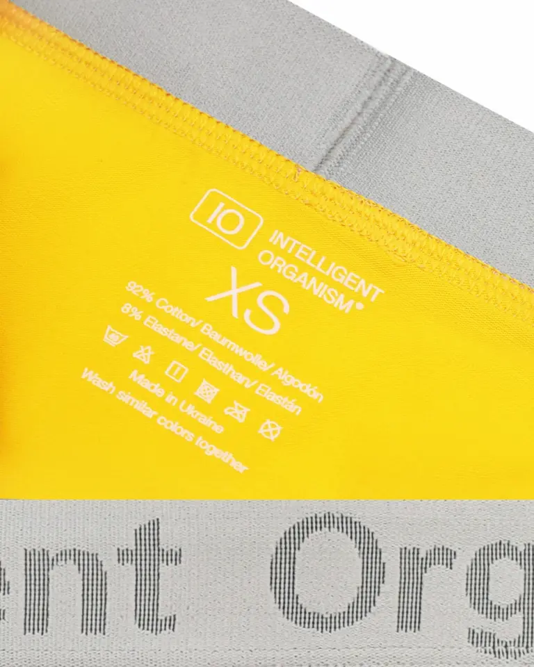 Жіночі жовті стрінги Intelligent Organism — внутрішній вигляд з термотрансферним розміром